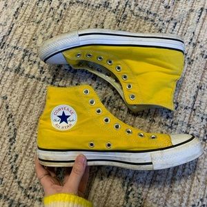 Yellow high top converse